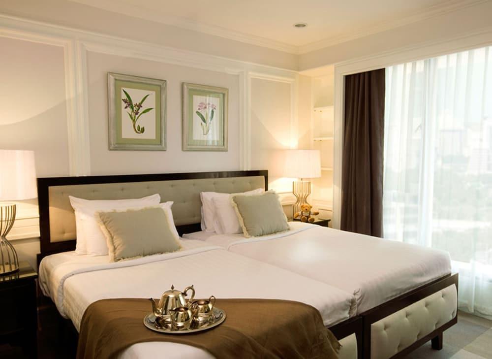 Cape House Langsuan Hotel Bangkok Extérieur photo A bedroom at the hotel